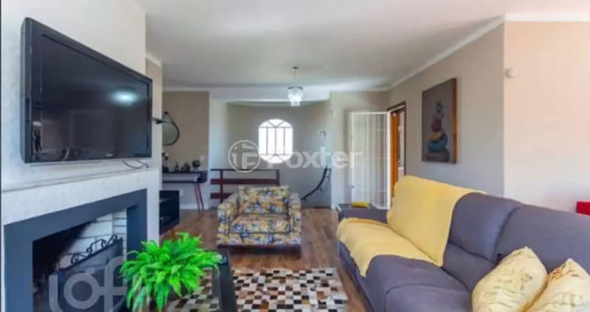 Casa com 4 quartos à venda na Rua Criciúma, 115, Guarujá, Porto Alegre