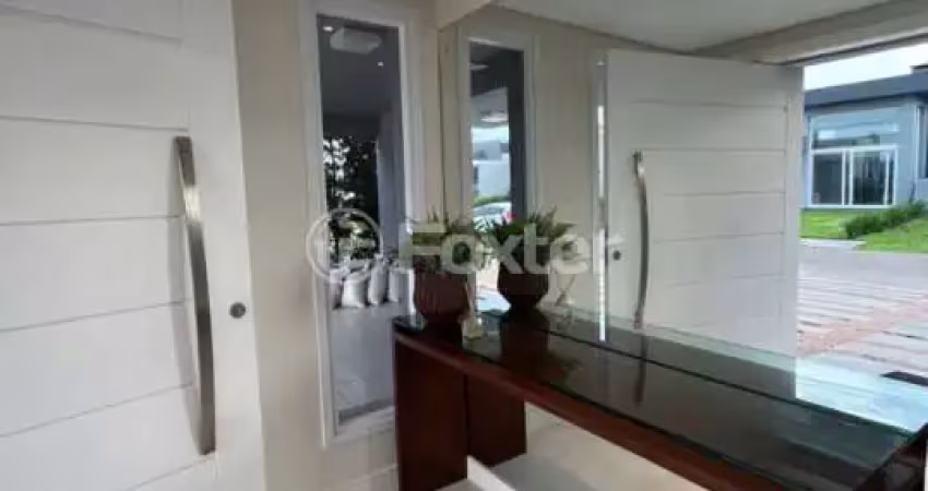Casa em condomínio fechado com 4 quartos à venda na Rua Honorio Ferreira Da Silva, 2009, Arco Íris, Capão da Canoa