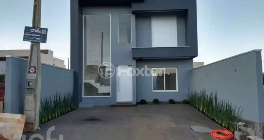 Casa com 3 quartos à venda na Rua Alcides Ferreira da Silva, 162, Loteamento Jardim Timbaúva, Gravataí