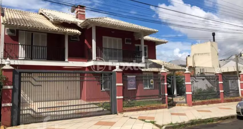 Casa com 5 quartos à venda na Rua Fermino Correa da Gama, 381, Vila Monte Carlo, Cachoeirinha