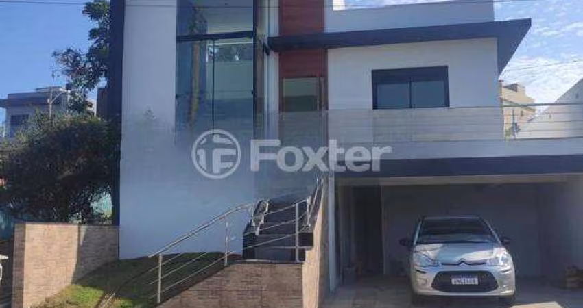 Casa em condomínio fechado com 3 quartos à venda na Rua Lino Estácio dos Santos, 1001, Oriço, Gravataí