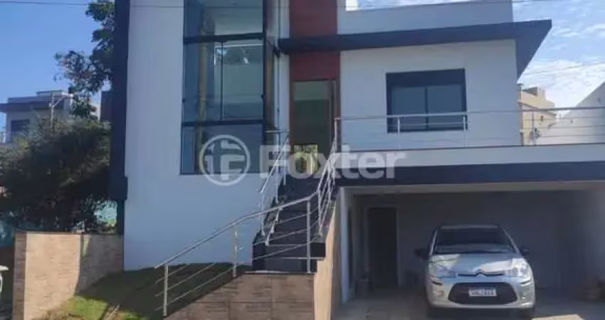 Casa em condomínio fechado com 3 quartos à venda na Rua Lino Estácio dos Santos, 1001, Oriço, Gravataí