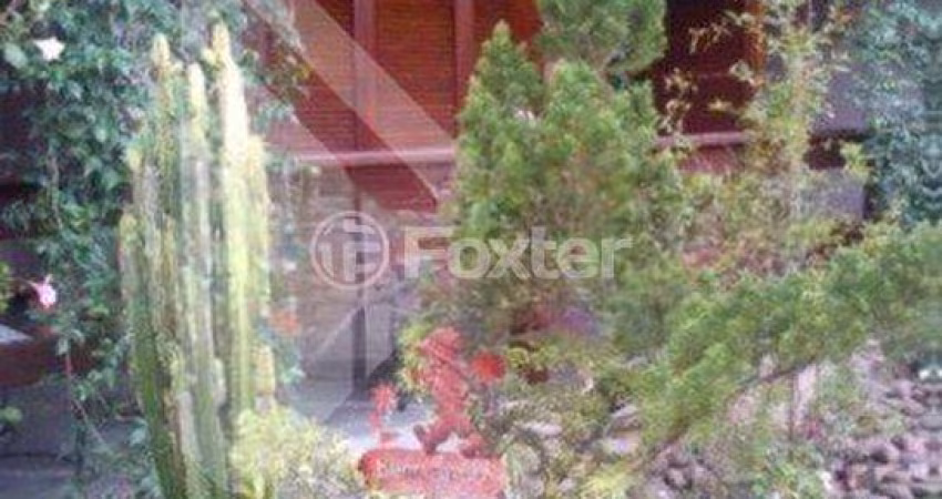 Casa com 3 quartos à venda na Avenida Guaíba, 13774, Serraria, Porto Alegre