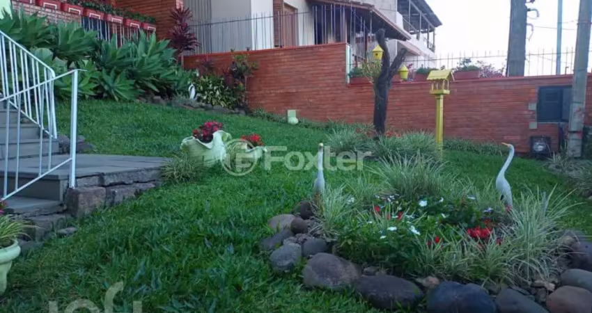 Casa com 3 quartos à venda na Rua Teotônia, 35, Camaquã, Porto Alegre