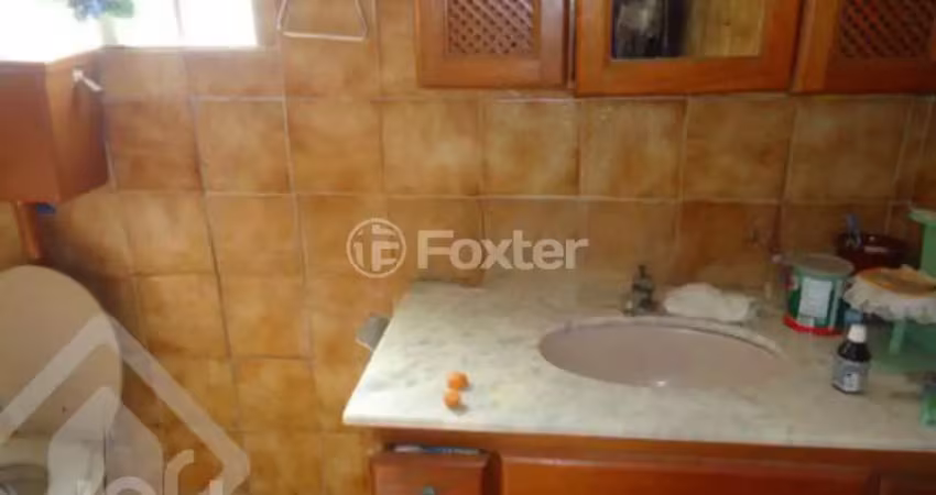 Casa com 3 quartos à venda na Rua Peri Melo, 245, Nonoai, Porto Alegre