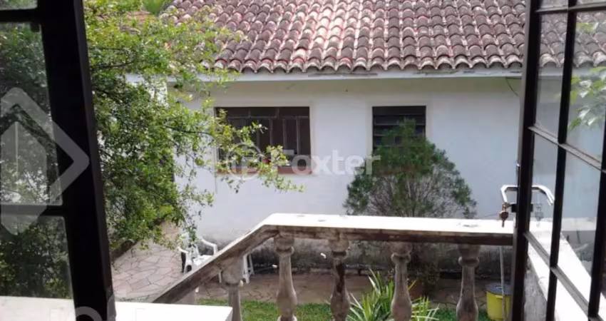 Casa com 3 quartos à venda na Rua Oscar Tollens, 170, Santa Tereza, Porto Alegre
