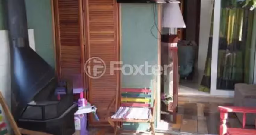 Casa com 3 quartos à venda na Rua Izar Faria Correa Sant'Anna, 153, Hípica, Porto Alegre