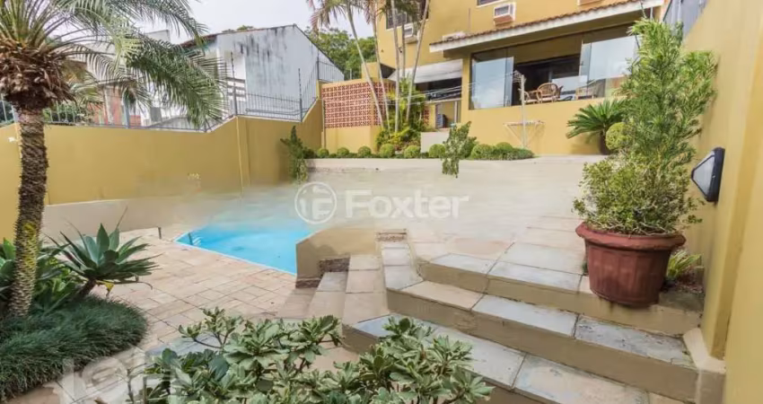 Casa com 4 quartos à venda na Rua Lloyd de Andrade Polidoro, 90, Ipanema, Porto Alegre