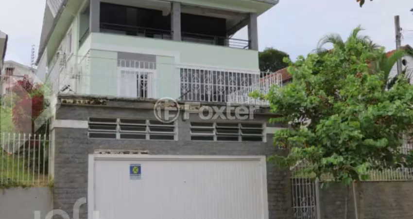 Casa com 5 quartos à venda na Rua Oscar Tollens, 98, Santa Tereza, Porto Alegre