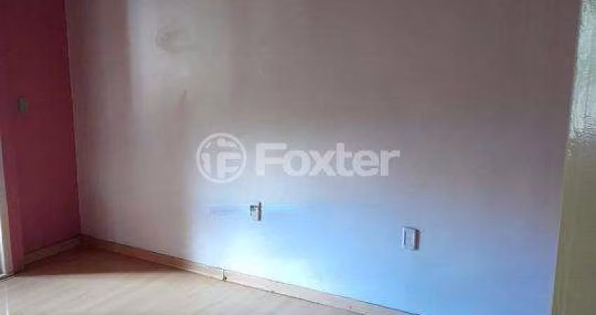 Casa com 3 quartos à venda na Rua Coronel Tisiano F. de Leoni, 275, Coronel Aparício Borges, Porto Alegre