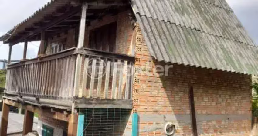 Casa com 3 quartos à venda na Rua Costa Lima, 657, Nonoai, Porto Alegre