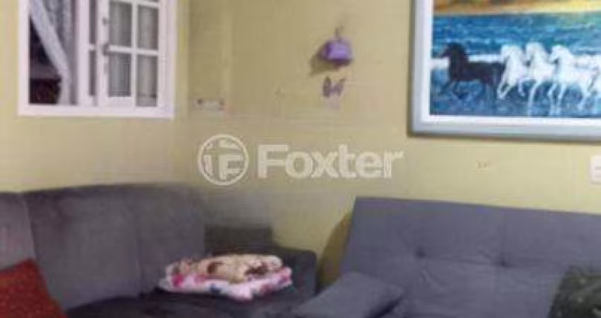 Casa com 3 quartos à venda na Rua João Bonuma, 165, Coronel Aparício Borges, Porto Alegre