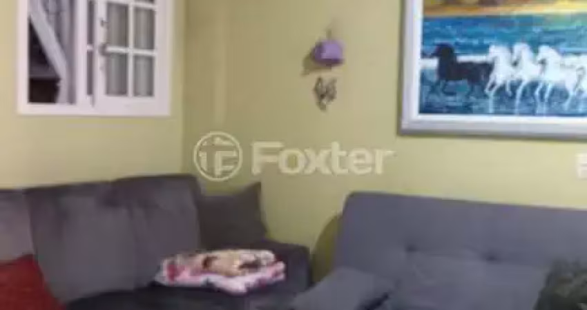 Casa com 3 quartos à venda na Rua João Bonuma, 165, Coronel Aparício Borges, Porto Alegre