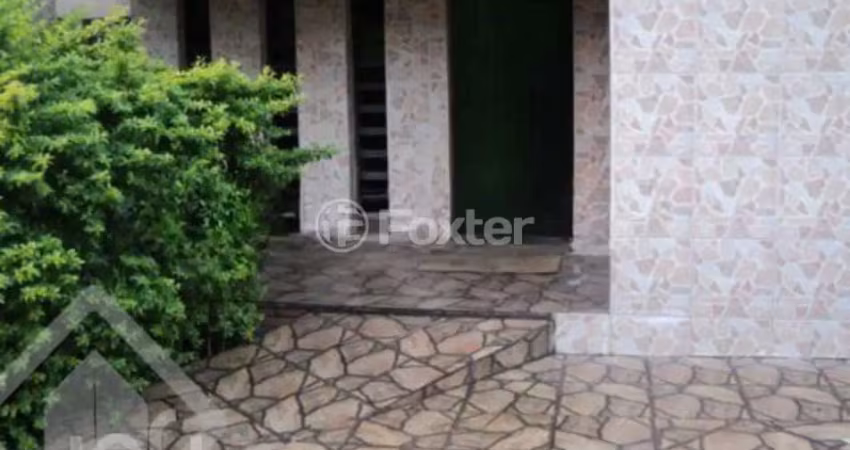 Casa com 3 quartos à venda na Rua Jataí, 860, Cristal, Porto Alegre
