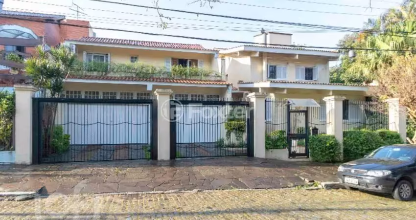 Casa com 5 quartos à venda na Rua Canto e Melo, 84, Nonoai, Porto Alegre