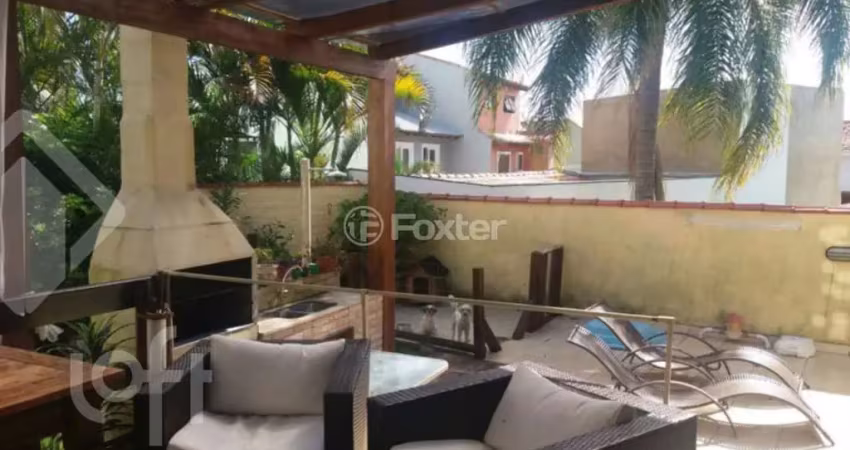 Casa com 4 quartos à venda na Rua Décio Pelegrini, 55, Ipanema, Porto Alegre