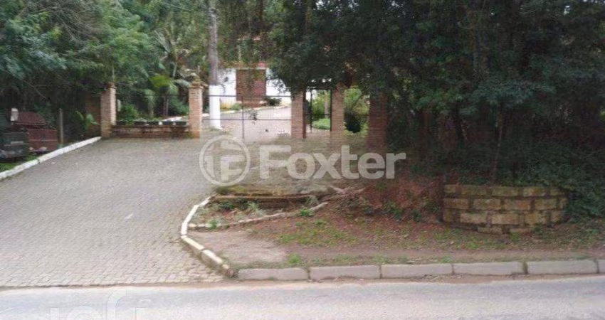 Casa com 3 quartos à venda na Estrada João Passuelo, 1100, Vila Nova, Porto Alegre