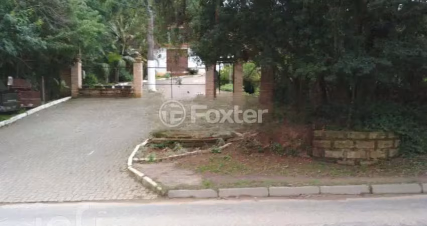 Casa com 3 quartos à venda na Estrada João Passuelo, 1100, Vila Nova, Porto Alegre