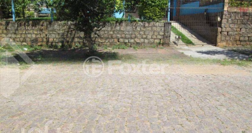 Casa com 5 quartos à venda na Rua Carlos Ferreira, 182, Teresópolis, Porto Alegre