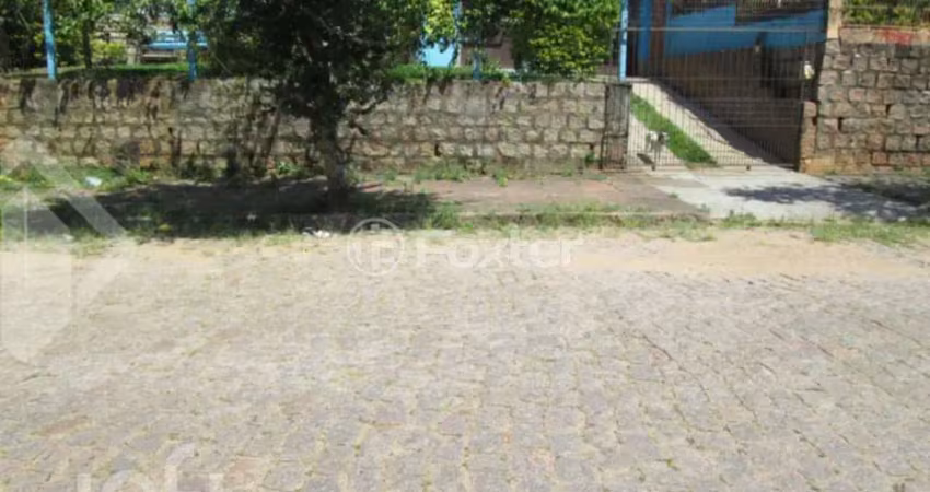 Casa com 5 quartos à venda na Rua Carlos Ferreira, 182, Teresópolis, Porto Alegre