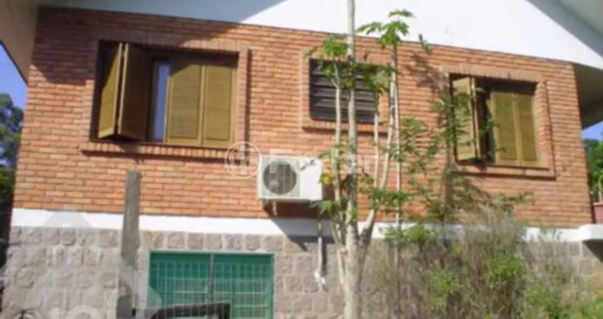 Casa com 3 quartos à venda na Estrada Kanazawa, 84, Vila Nova, Porto Alegre