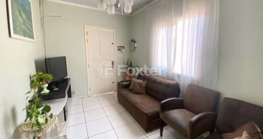 Casa com 5 quartos à venda na Rua Afonso Arinos, 909, Camaquã, Porto Alegre