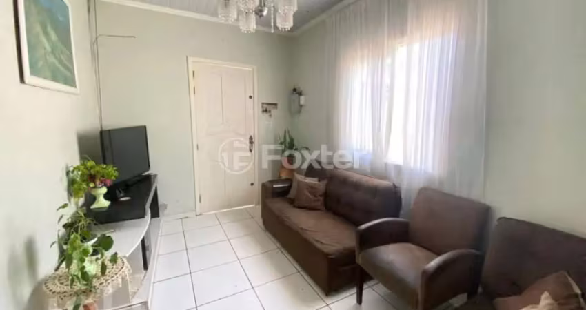 Casa com 5 quartos à venda na Rua Afonso Arinos, 909, Camaquã, Porto Alegre