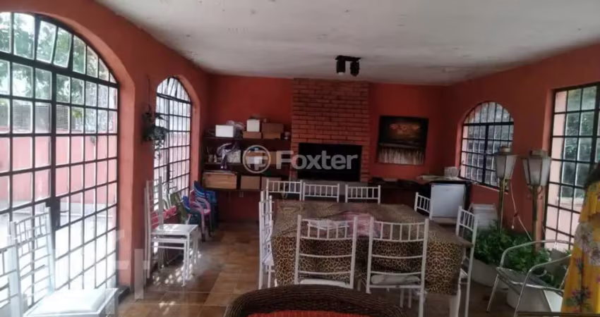 Casa com 3 quartos à venda na Rua dos Minuanos, 264, Espírito Santo, Porto Alegre