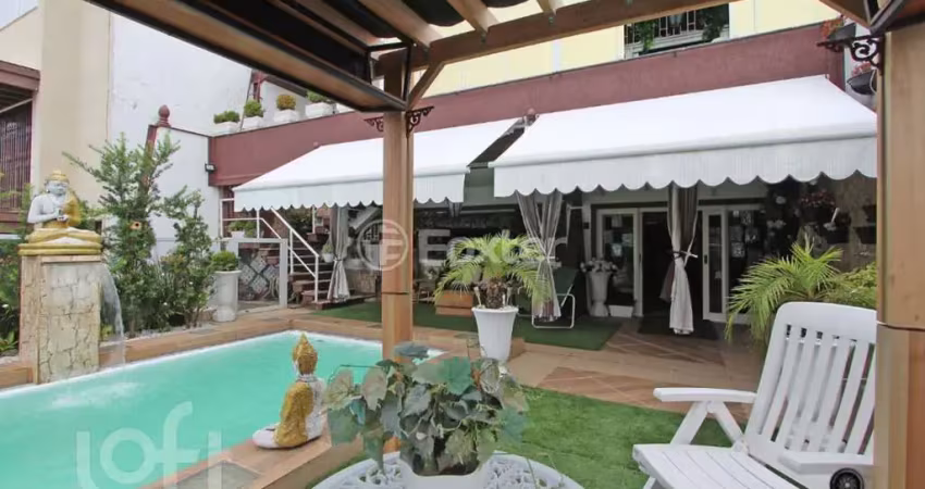 Casa com 4 quartos à venda na Rua Catão Coelho, 111, Medianeira, Porto Alegre