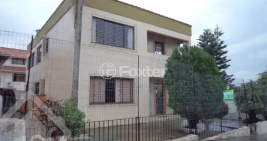 Casa com 5 quartos à venda na Rua Hortêncio Rodrigues Barbosa, 157, Campo Novo, Porto Alegre
