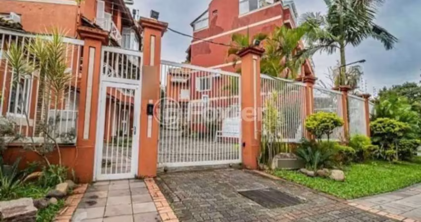 Casa em condomínio fechado com 3 quartos à venda na Avenida Guaíba, 4400, Vila Assunção, Porto Alegre
