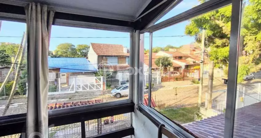 Casa com 6 quartos à venda na Rua Fábio de Barros, 388, Nonoai, Porto Alegre
