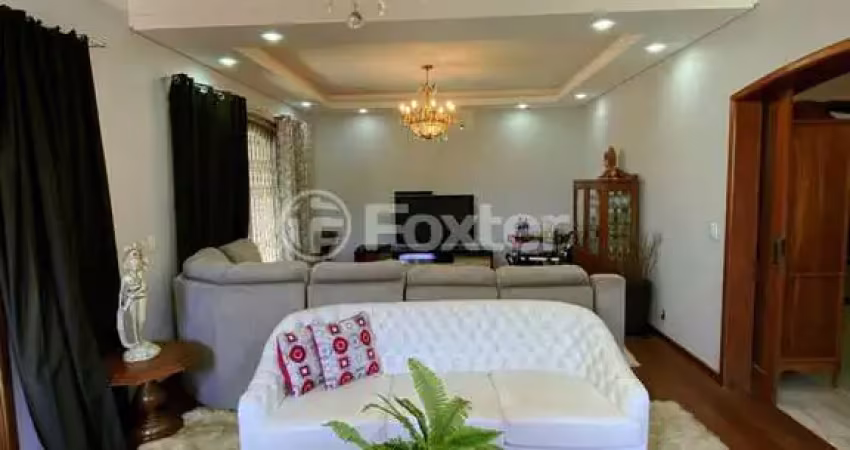 Casa com 4 quartos à venda na Rua Fernando Osório, 275, Teresópolis, Porto Alegre