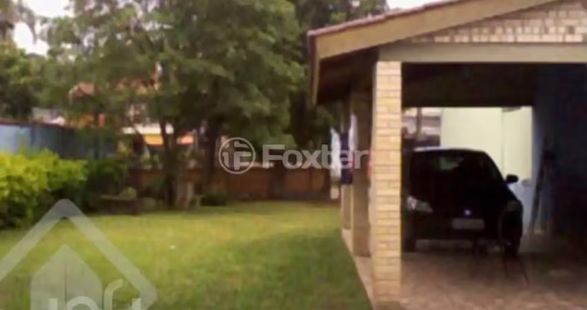 Casa com 2 quartos à venda na Avenida Guarujá, 155, Guarujá, Porto Alegre