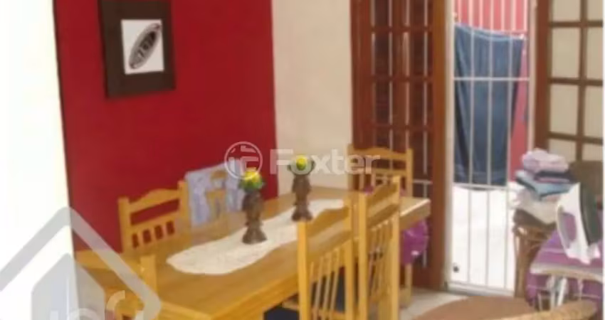 Casa em condomínio fechado com 3 quartos à venda na Rua Osório Mendes Ouriques, 332, Guarujá, Porto Alegre