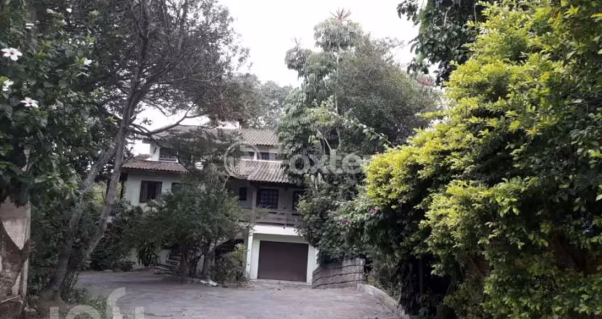Casa com 6 quartos à venda na Rua Santa Maria, 370, Vila São José, Porto Alegre