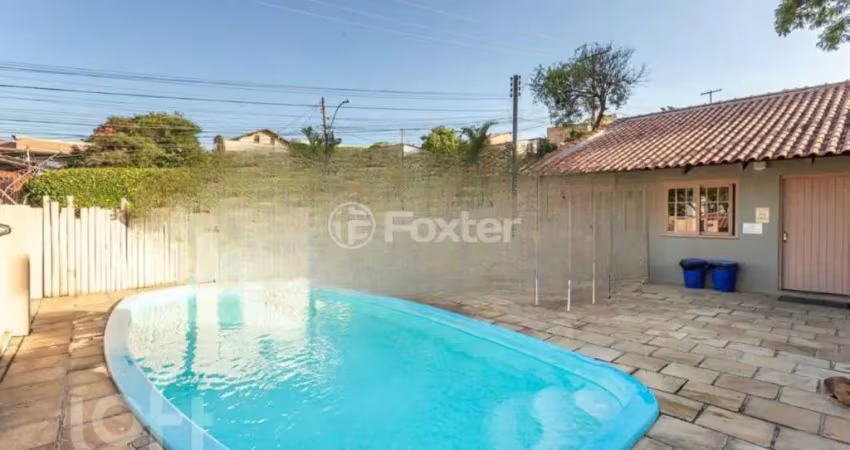 Casa em condomínio fechado com 3 quartos à venda na Rua Humberto de Campos, 601, Partenon, Porto Alegre