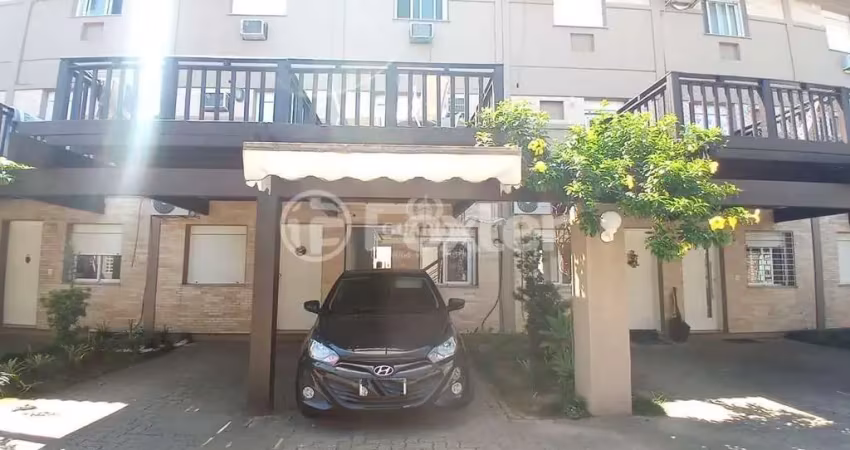 Casa em condomínio fechado com 3 quartos à venda na Avenida Juca Batista, 473, Cavalhada, Porto Alegre