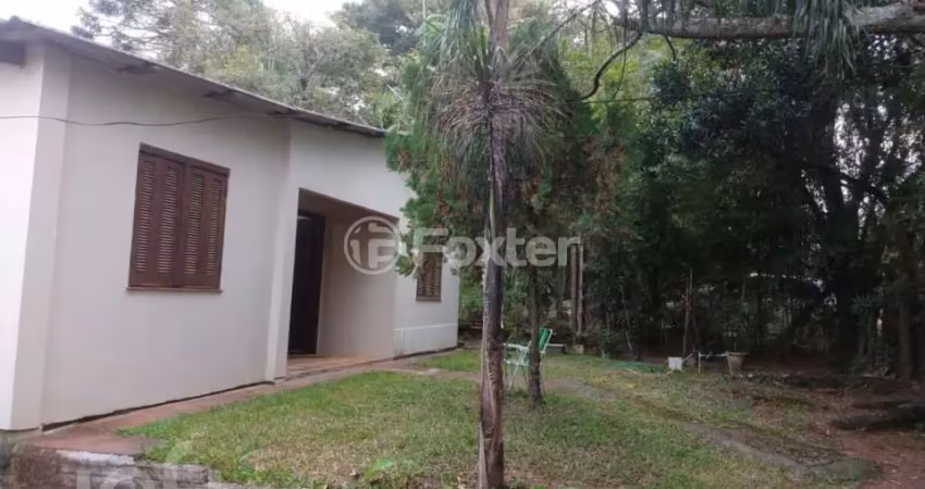 Casa com 3 quartos à venda na Estrada Kanazawa, 50, Vila Nova, Porto Alegre