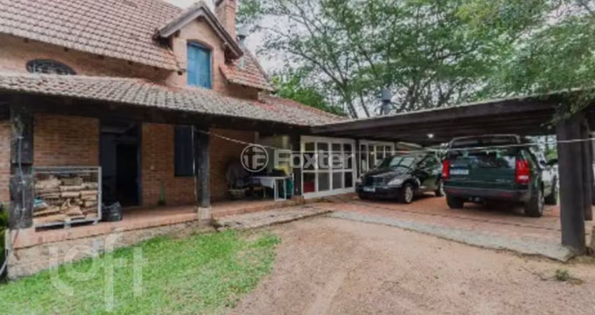 Casa com 3 quartos à venda na Rua dos Pescadores, 1700, Arquipélago, Porto Alegre