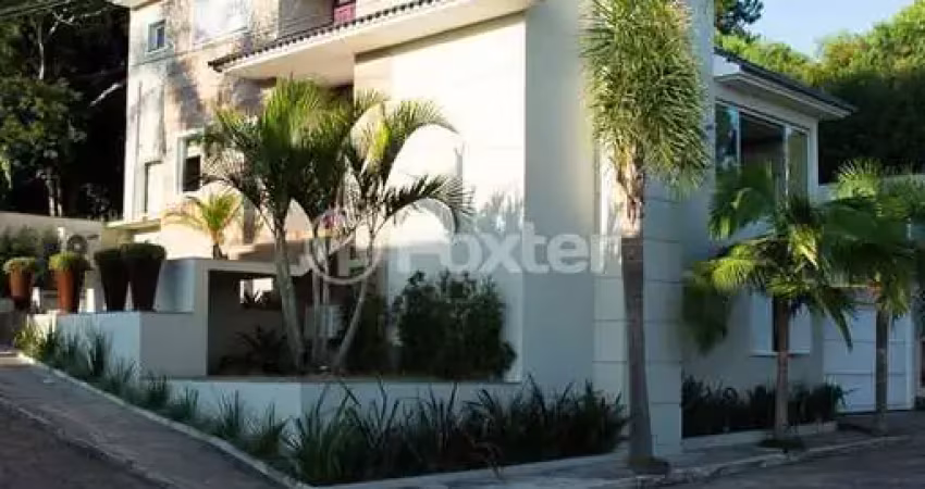 Casa em condomínio fechado com 3 quartos à venda na Avenida Vicente Monteggia, 1020, Cavalhada, Porto Alegre