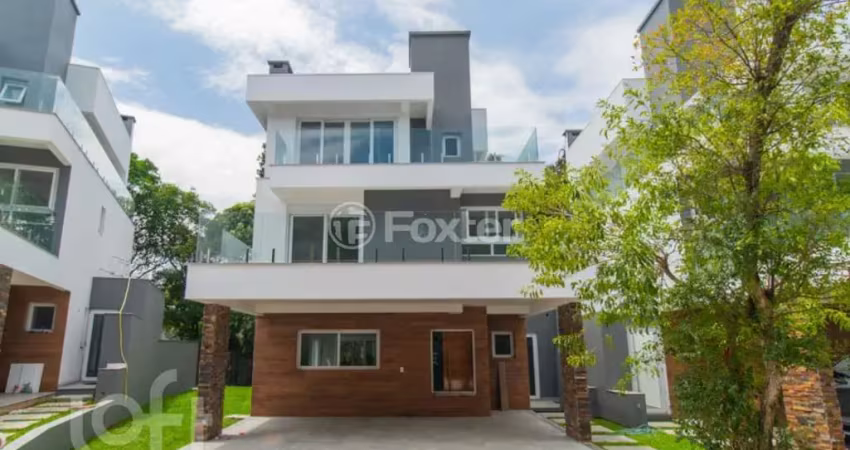 Casa em condomínio fechado com 3 quartos à venda na Avenida Coronel Marcos, 1239, Pedra Redonda, Porto Alegre
