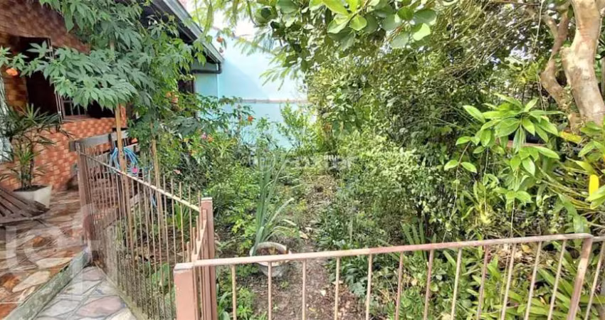 Casa com 3 quartos à venda na Rua Santa Mônica, 591, Ponta Grossa, Porto Alegre