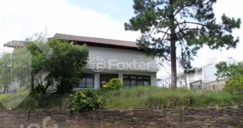 Casa com 4 quartos à venda na Rua Teixeira de Carvalho, 55, Medianeira, Porto Alegre