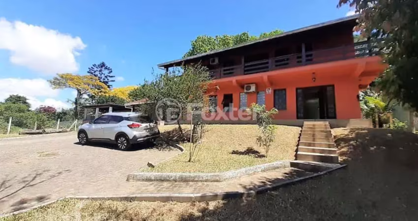 Casa com 3 quartos à venda na Rua Florêncio Farias, 848, Belém Novo, Porto Alegre