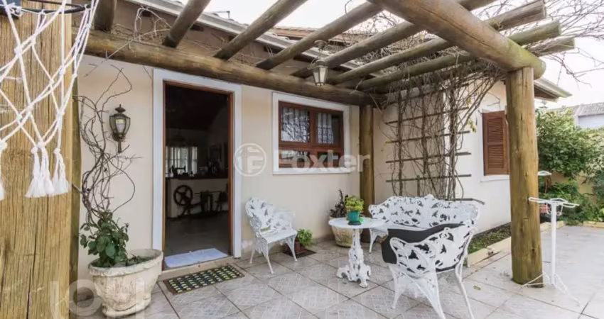 Casa com 4 quartos à venda na Rua Daniel Petter Schneider, 83, Parque Santa Fé, Porto Alegre