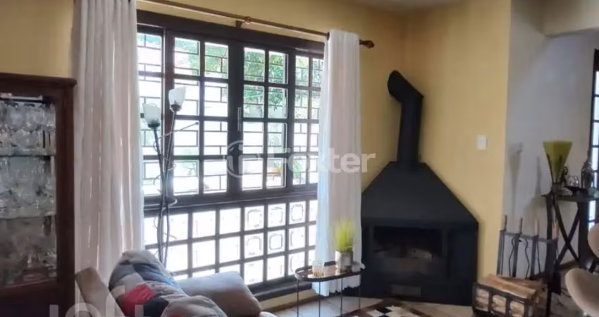Casa com 3 quartos à venda na Rua Itaboraí, 1335, Jardim Botânico, Porto Alegre