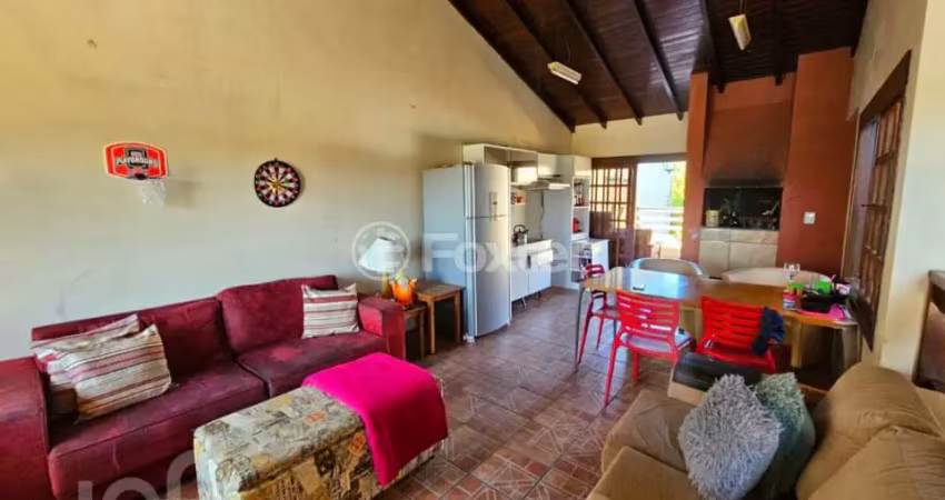 Casa com 4 quartos à venda na Rua Bezerra de Menezes, 135, Passo da Areia, Porto Alegre