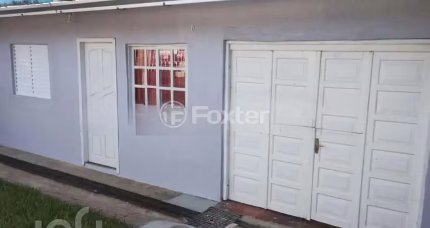 Casa com 3 quartos à venda na Rua Estados Unidos, 6, Guajuviras, Canoas