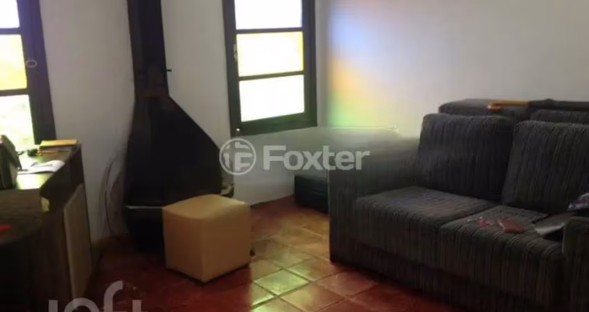 Casa com 4 quartos à venda na Avenida Guarujá, 136, Guarujá, Porto Alegre